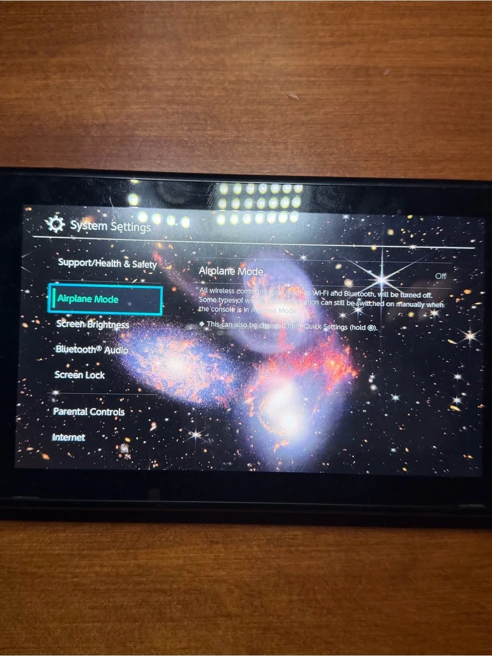 Nintendo Switch with Clear Shell and Pink Screen Artwork